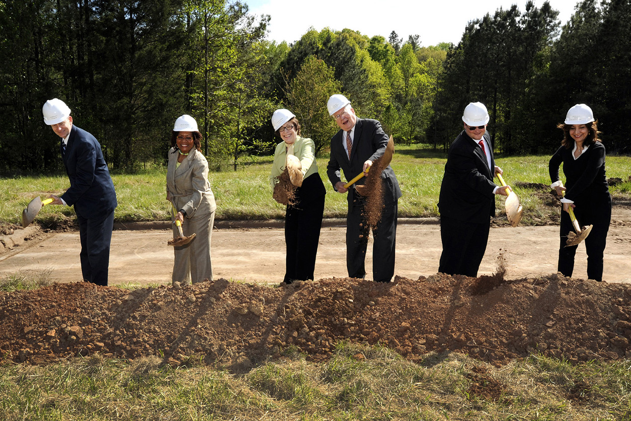 Wheeland; Cole-McFadden; Birnbaum; Price; Victor Stancil, project officer with ORF; and Sepideh Saidi, president and CEO of SEPI Engineering and Construction shovel dirt as part of the groundbreaking celebration