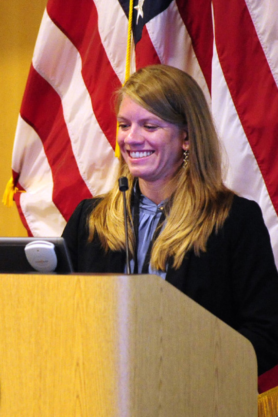 Rachel Krasich in front of a podium