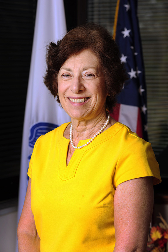 Linda Birnbaum, Ph.D in a yellow dress