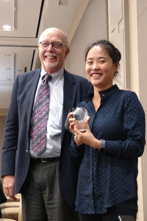 Suk Ph.D., left, presented the Wetterhahn Award to Kim