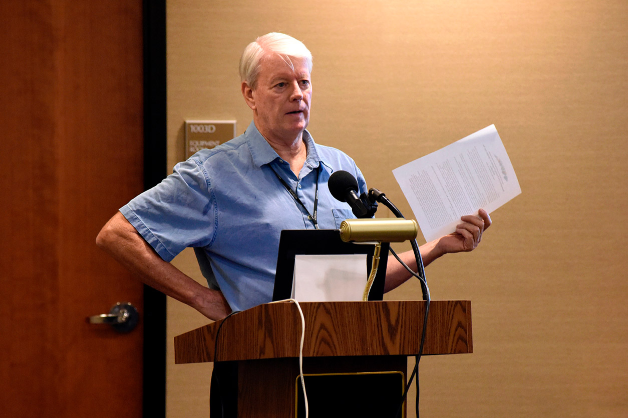 Joseph “Chip” Hughes, WTP Director at a podium