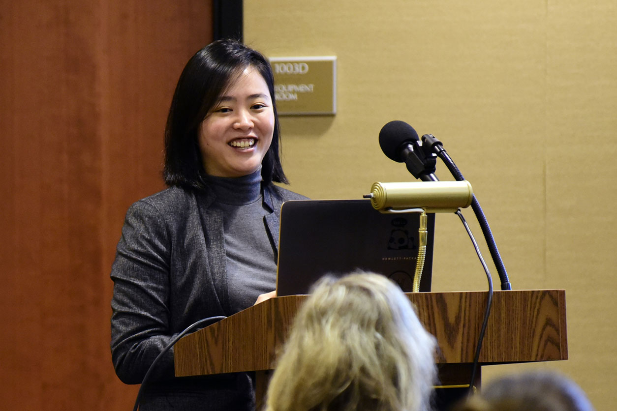 Stephanie Kim, Ph.D. at the podium