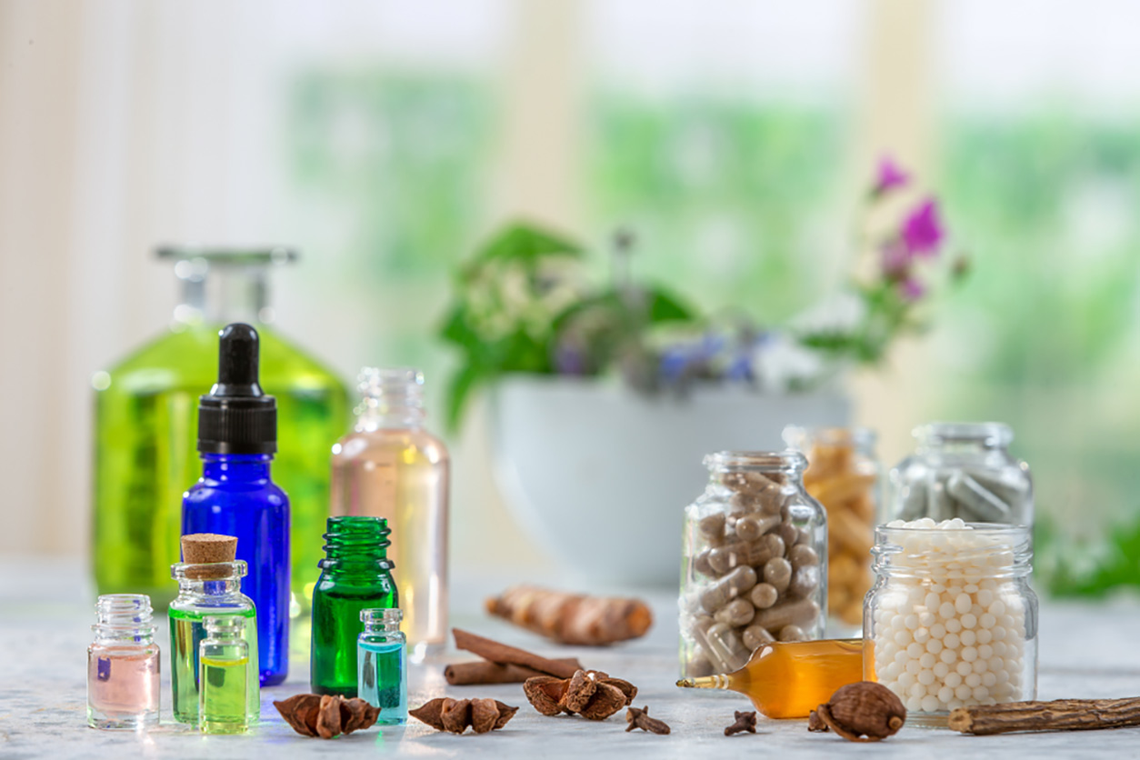 Botanical dietary supplements and essential oils in glass jars