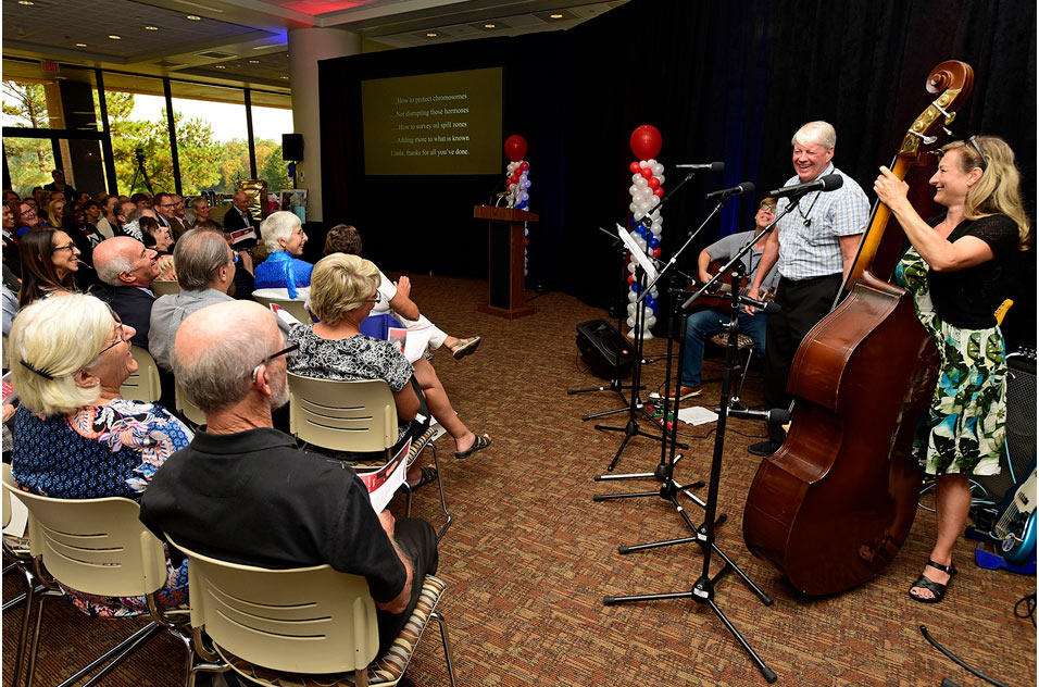 Mike Conway, Chip Hughes and Heather Henry playing for a crowd in 2019