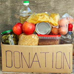 box containing food items labeled as DONATION
