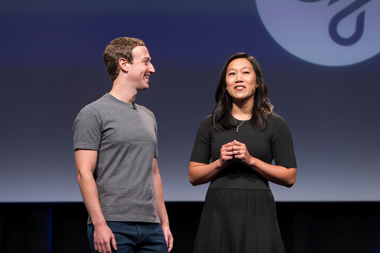Mark Zuckerberg, left, and his wife Priscilla Chan, right