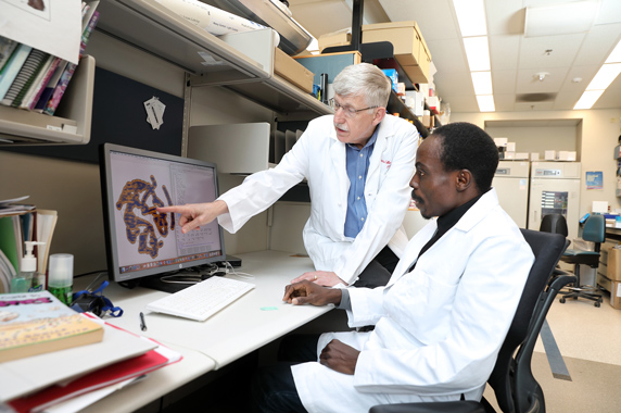 Idowu Aimola, Ph.D., and Francis Collins, M.D., Ph.D