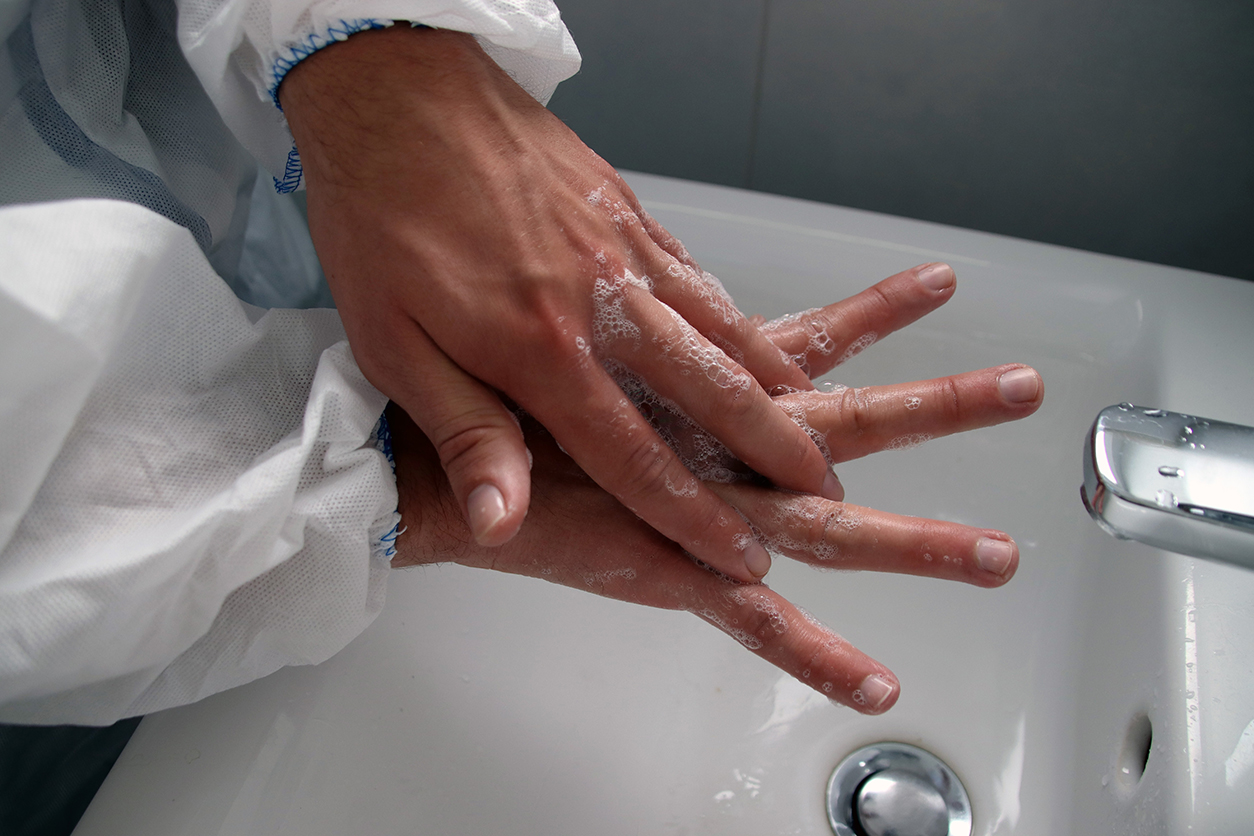 Medical professional washing hands