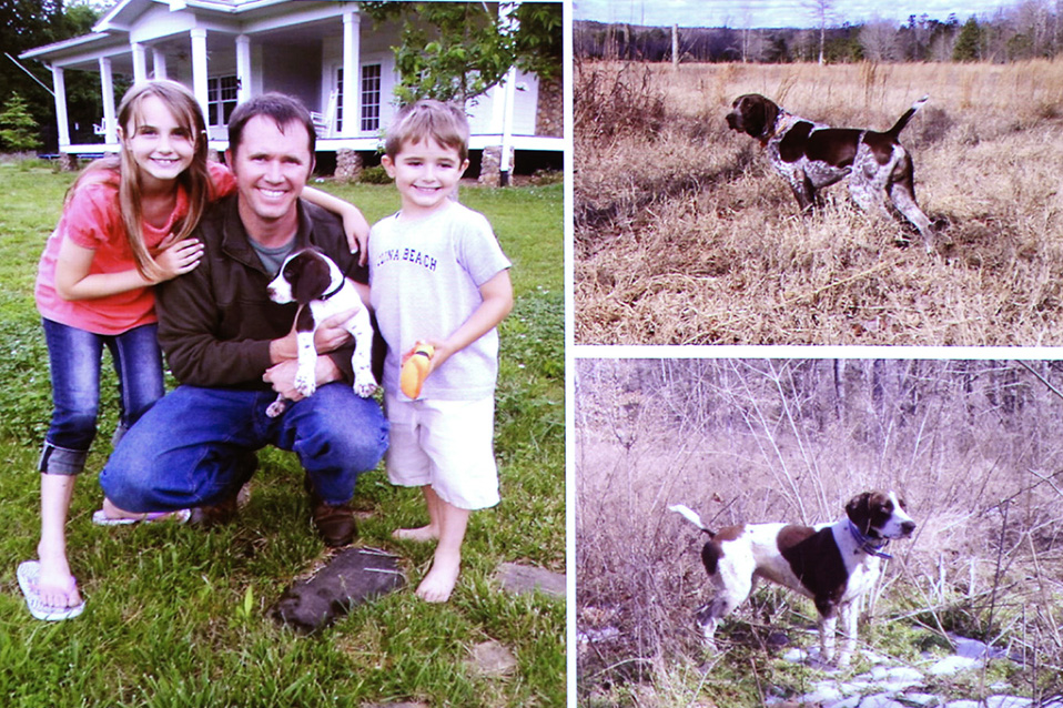Slide from Tucker&#39;s presentation showing him with his two children and two of his dogs
