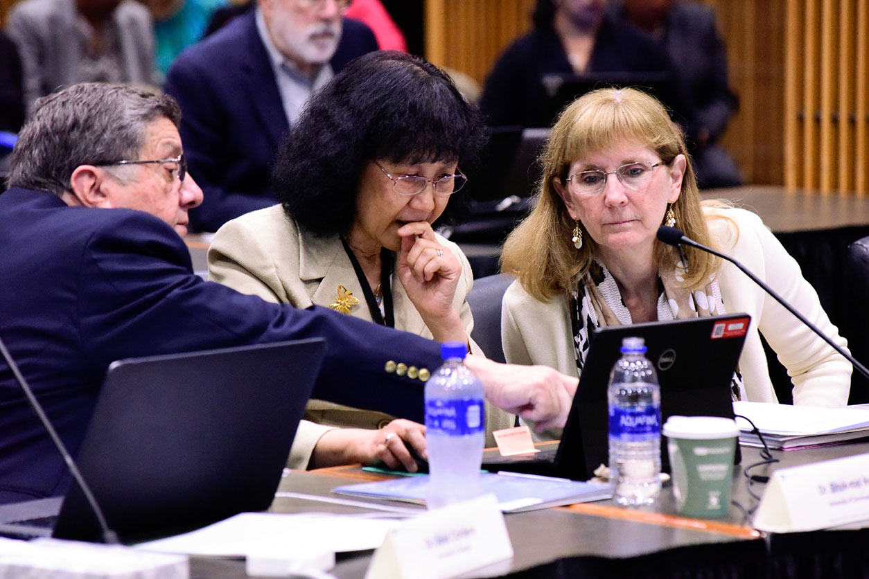 Cordero, Shuk-Mei and Schantz speak during the meeting