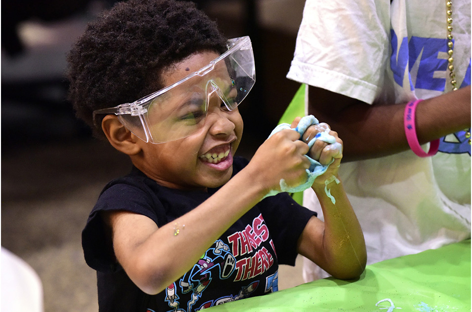 boy playing with slime