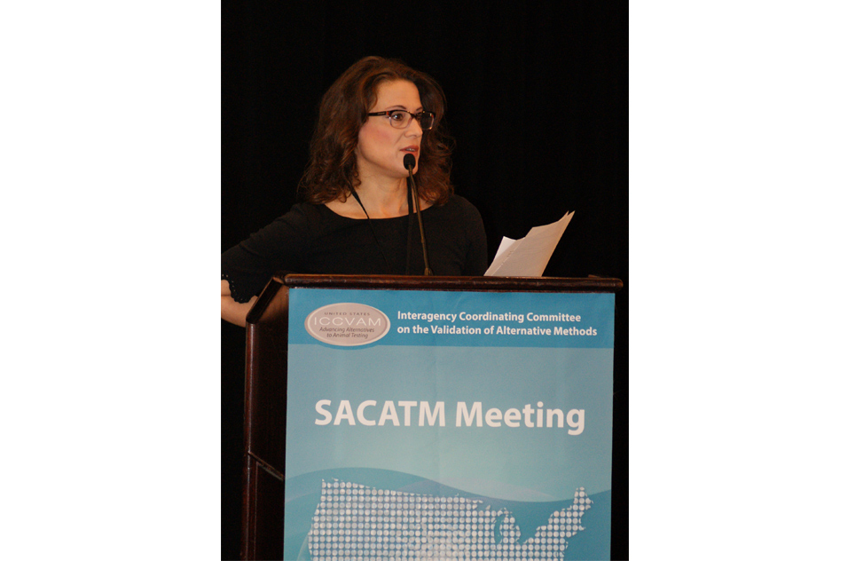 Jessica Ryman-Rasmussen, Ph.D. at podium of SACATM Meeting