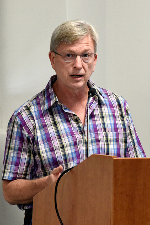 Kevin Gerrish, Ph.D. at a podium