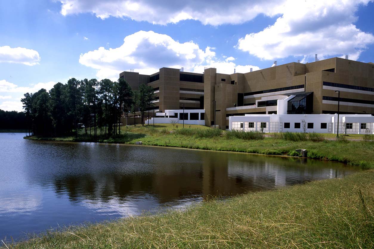 Side view of the NIEHS building adjacent to the lake