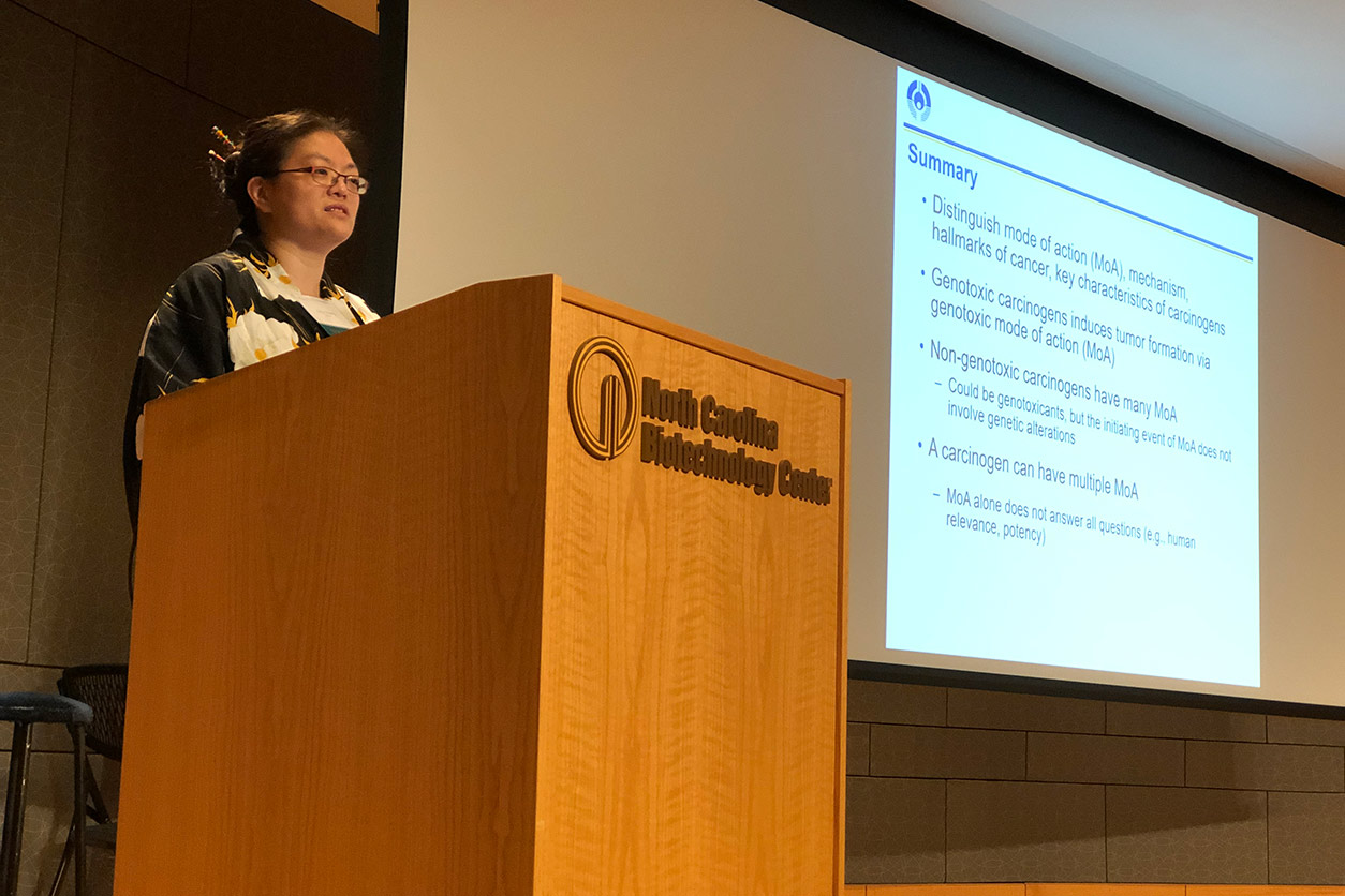 Amy Wang, Ph.D., NTP, at podium