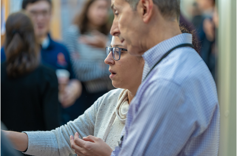 Darryl Zeldin, M.D. and Florencia Pascual, Ph.D. engaging in a conversation