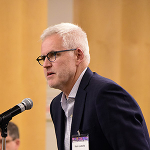 Hans Luecke, Ph.D., asking a question during the presentation