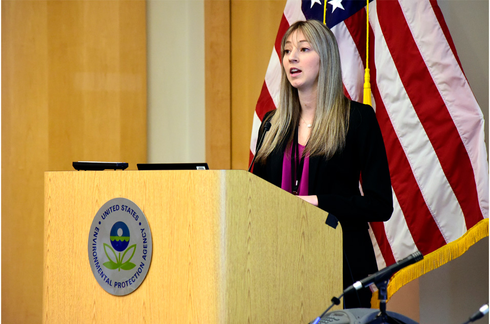 Madison Ortega speaks at podium