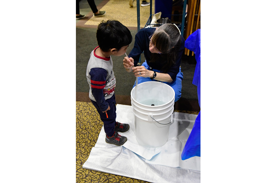 Child learns about lung capacity