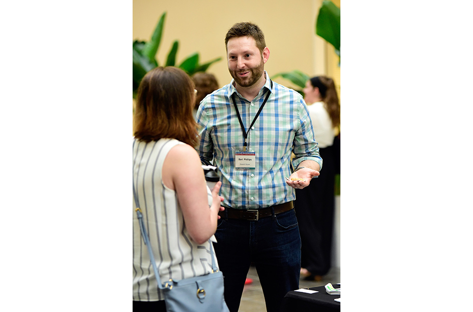 Bart Phillips chatting with an attendee during the event