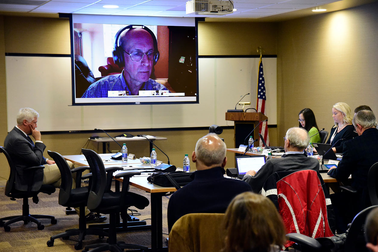 BSC Chair, David Eaton, Ph.D., on screen with seated audience in foreground