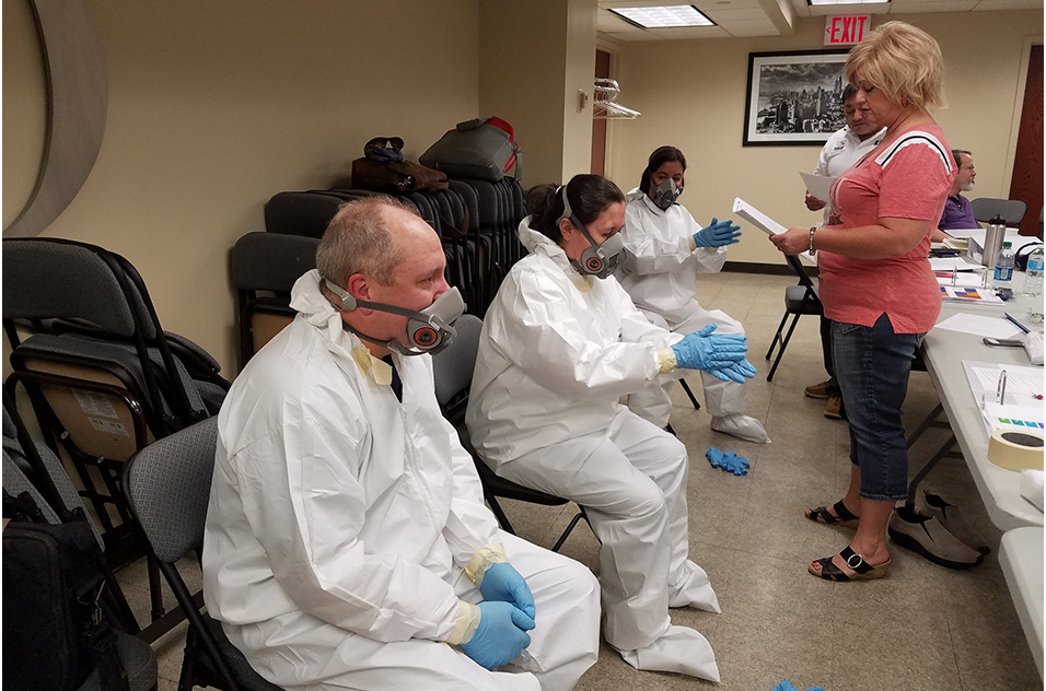 people participate in infectious disease training
