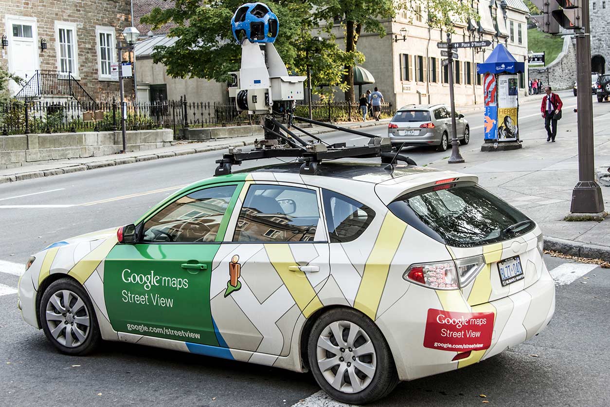 a side view of a Google Maps street view car