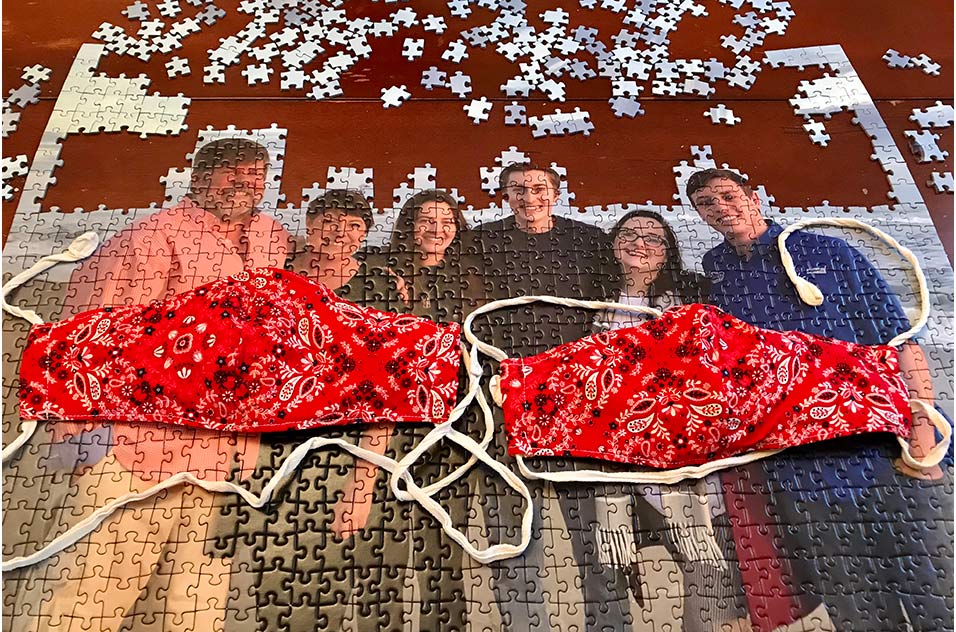 red bandana masks on a Schelp family photo puzzle
