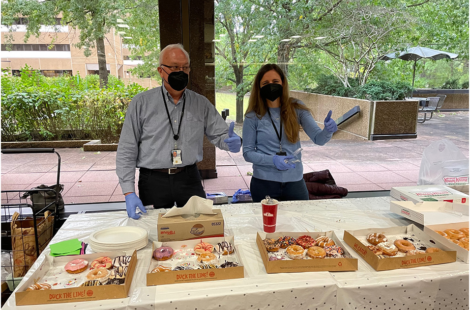 The “doughnut squad,” Paul Doetsch, Ph.D., and Robin Stanley, Ph.D.