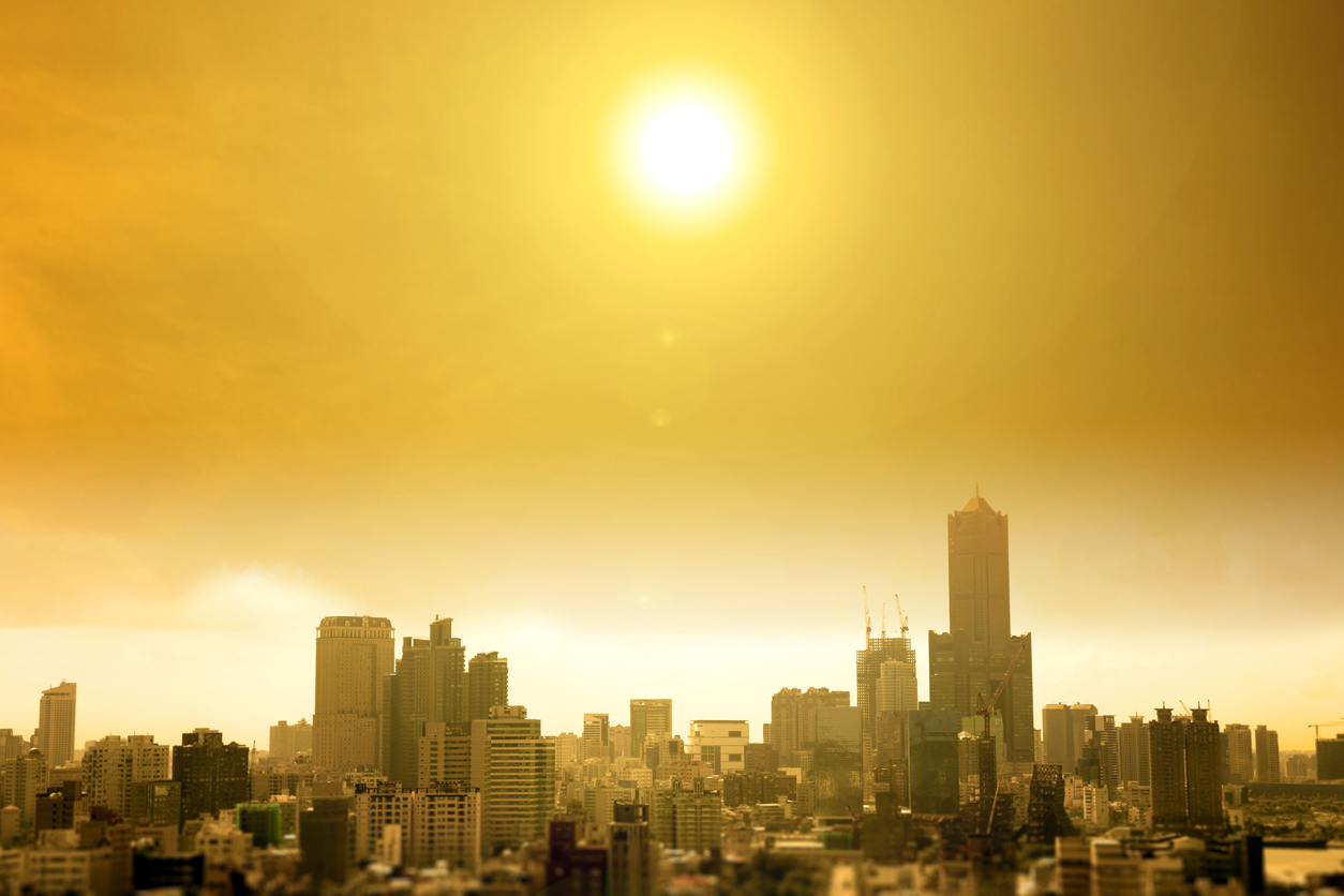 Sun and haze over a city
