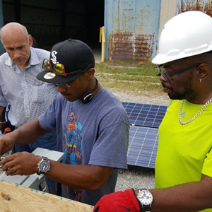 ECWTP trainees in Chicago learn how to install solar panels