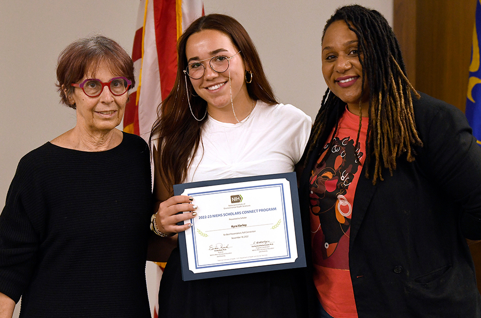 Claudia Thompson, Ph.D., chief of the Population Health Branch (PHB), left, Kyra Varley, center, and Melissa Judd-Smarr, Ph.D., a PHB health scientist administrator, right.