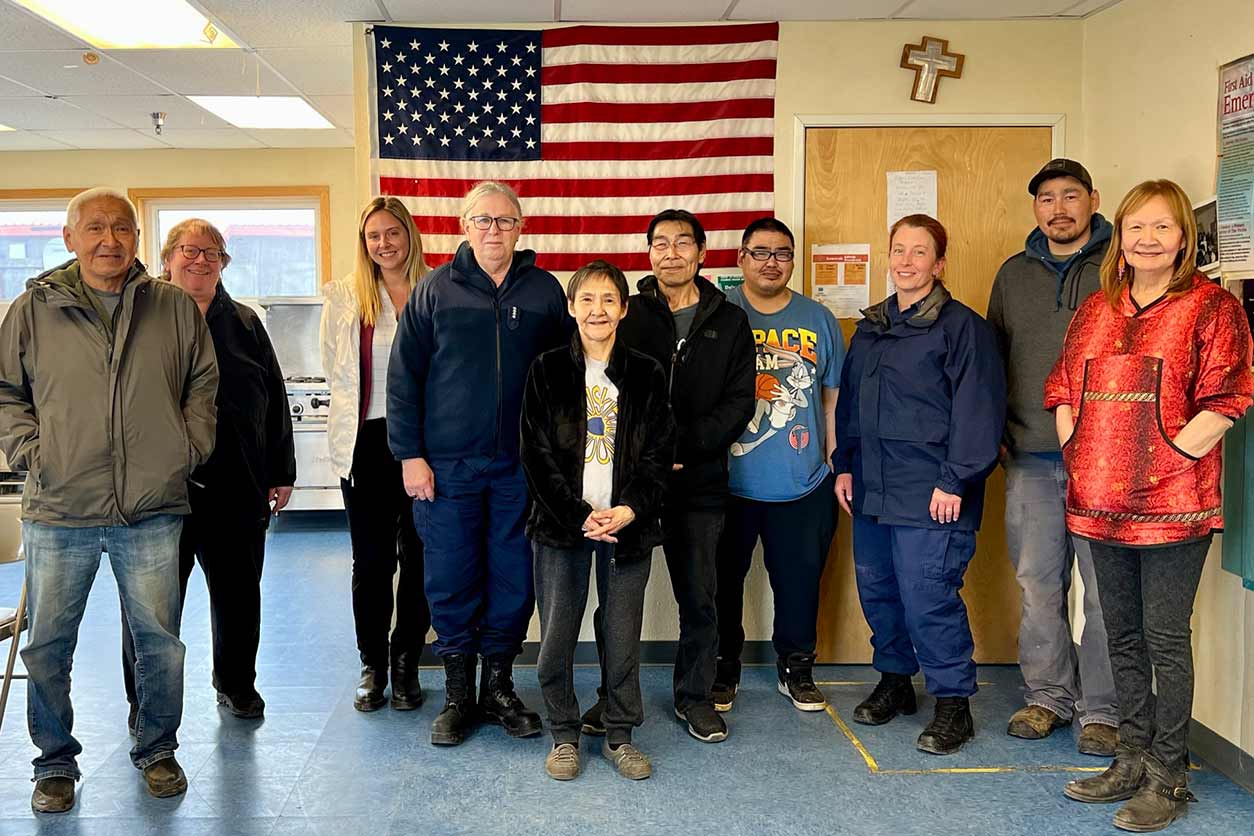 Pamela Miller, second from left, Viola “Vi” Waghiyi, environmental health and justice program director for ACAT, far right, and members of the Native Village of Savoonga shared contamination and climate concerns with Adm. Levine Aug.7. (Photo courtesy of Kim Seigfreid / HHS). 