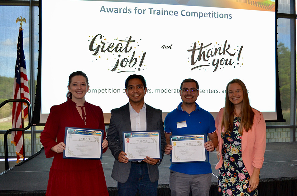 Anika Dzierlenga, Ph.D., right, presented certificates to from left to right, Erin Huber, Ph.D., Alper Alcaraz, Ph.D., and Jose Teofilo Moreira Filho, Ph.D.