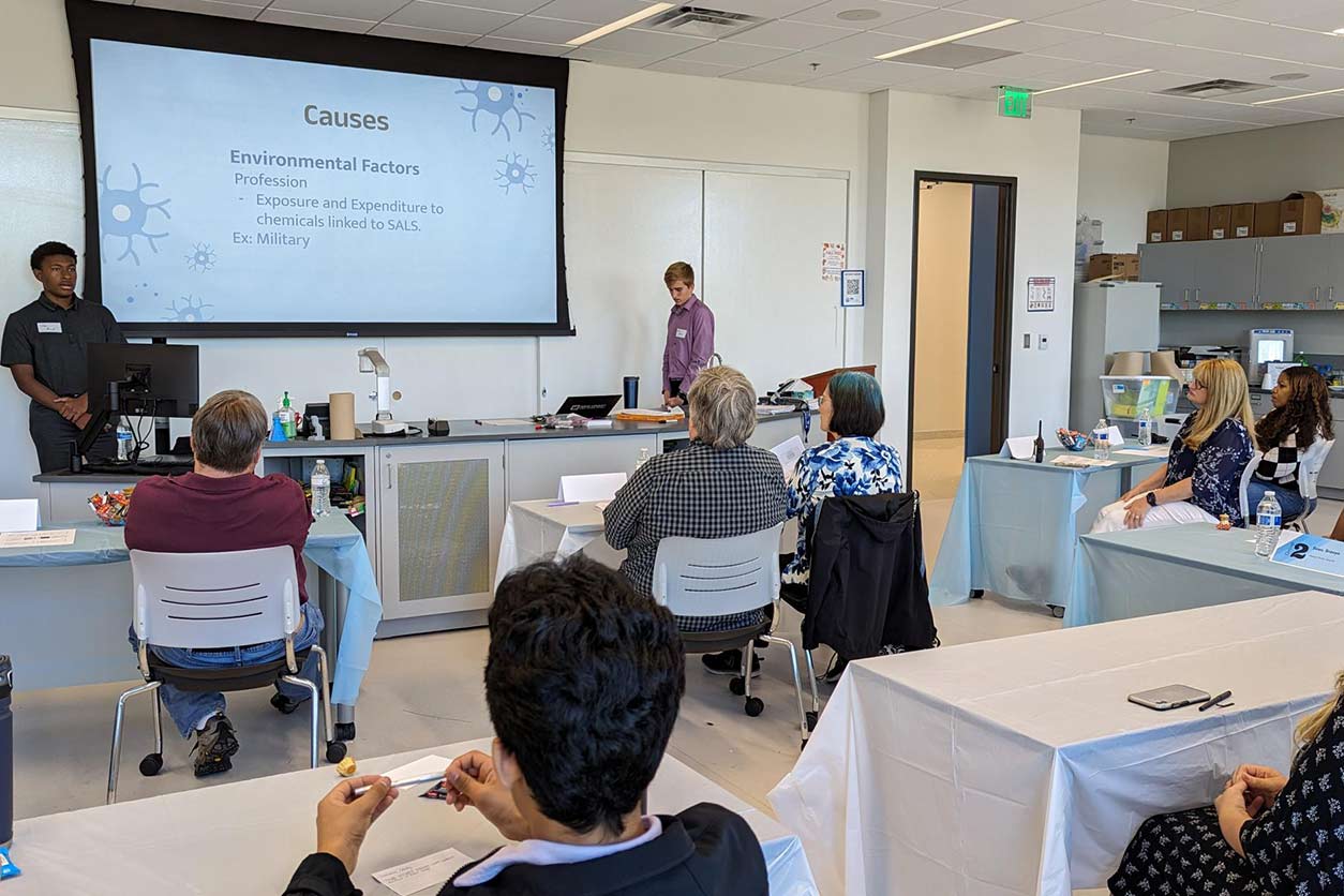 Students presented the human health problems they wanted to solve in class at the first meeting with NIEHS scientists. (Photo courtesy of NC Biotech.)