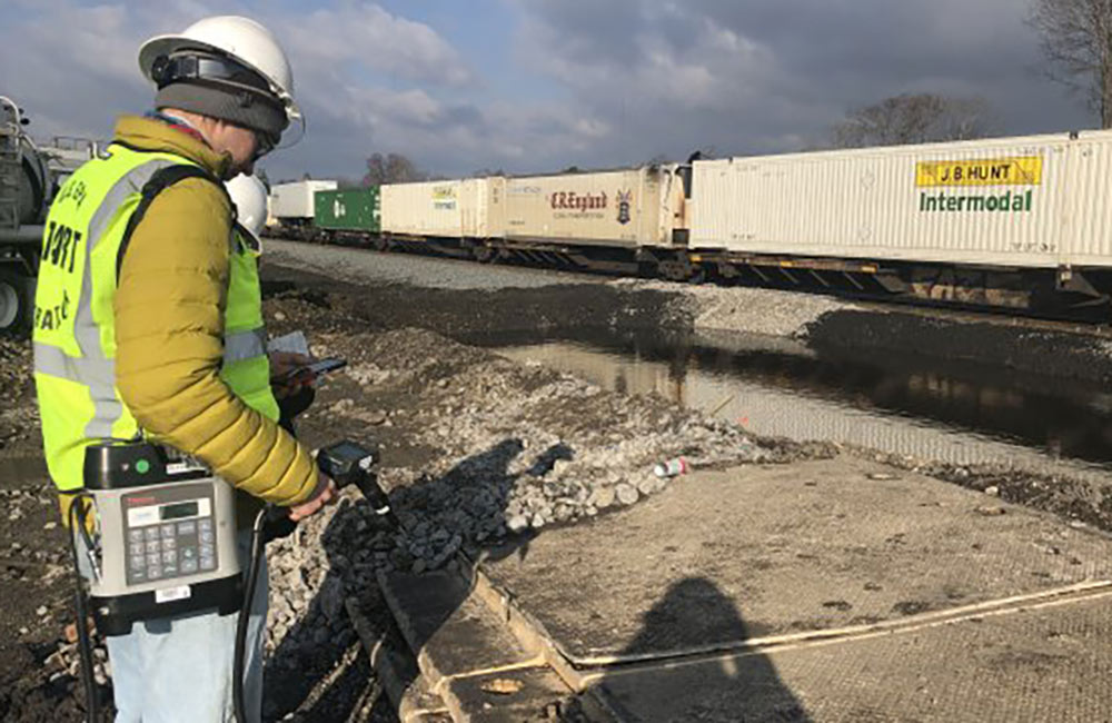 A worker participates in the cleanup after the Feb. 3 train derailment in East Palestine, Ohio.