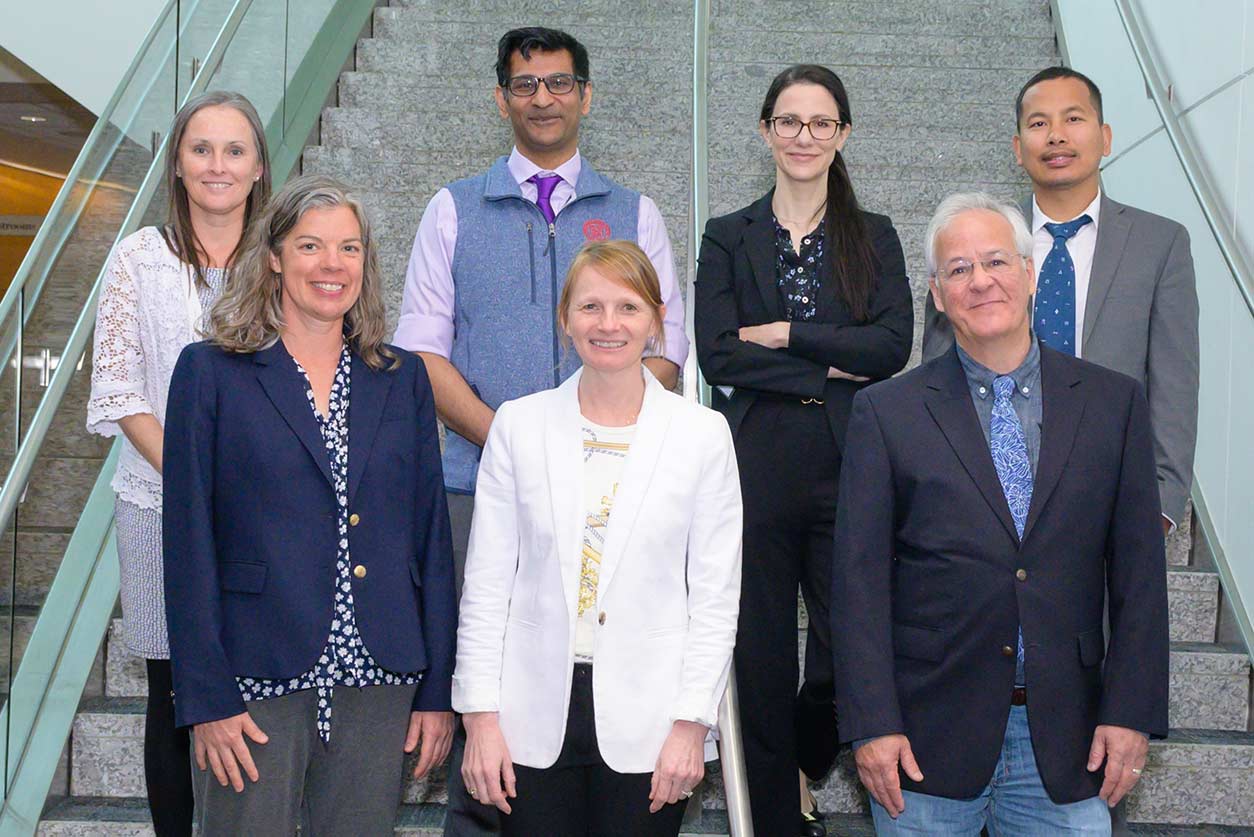 The seven current NIH Climate and Health Scholars gathered at NIH in April. Back row, left to right: Caradee Wright, Ph.D., Arnab Ghosh, M.D., Stefania Papatheodorou, Ph.D., M.D., Samendra Sherchan, Ph.D. Front row, left to right: Julie Postma, Ph.D., Laura Geer, Ph.D., and Ricardo Wray, Ph.D.