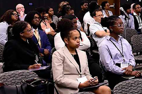 Students from North Carolina HBCUs sit in conference room during NIEHS Scholars Connect Program Annual Symposium