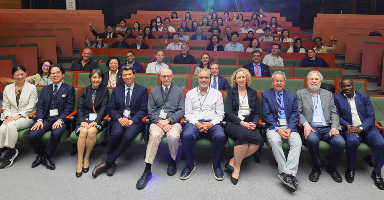 Rick Woychik, fifth from left, with global health colleagues at the Sapporo Exposome Conference in Japan. (Photo courtesy of the Sapporo Exposome Conference).