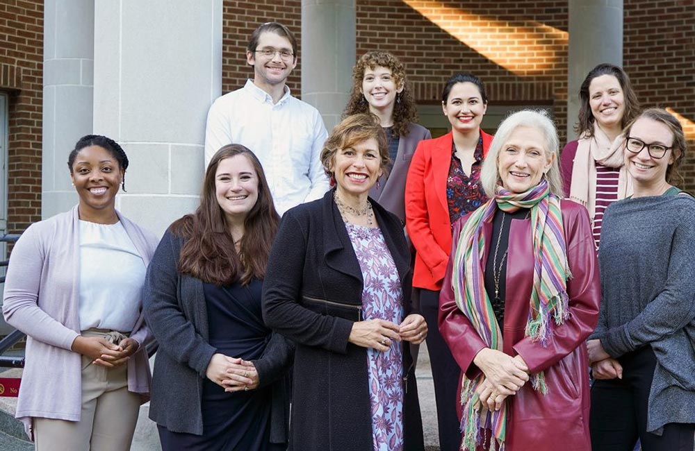 Maria Savasta-Kennedy, J.D., center left in front; collaborating litigator, Cathy Cralle Jones, J.D., center right in front; and UNC law students 