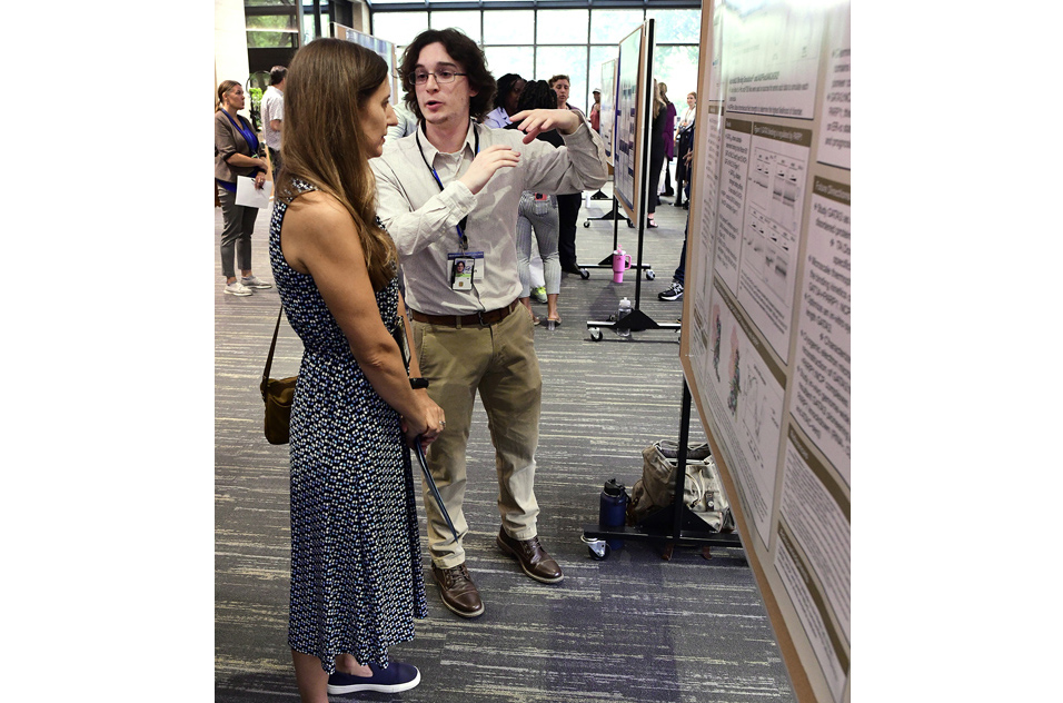 Justin Stegeman at poster session