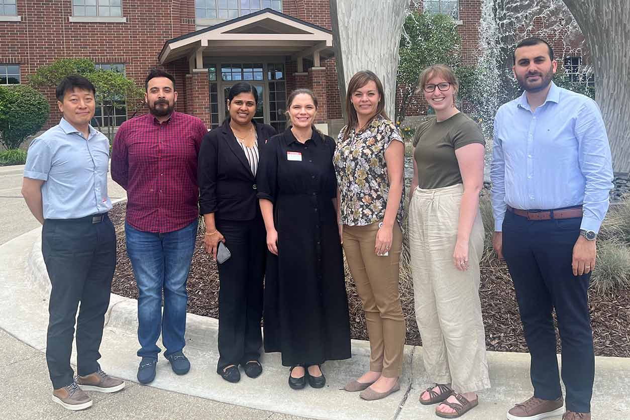 Aswani Unnikrishnan and Bridgett Hill, third and fourth from left, conducted ICE training at NSF International headquarters in July. (Image courtesy Kelly Magurany, NSF International)