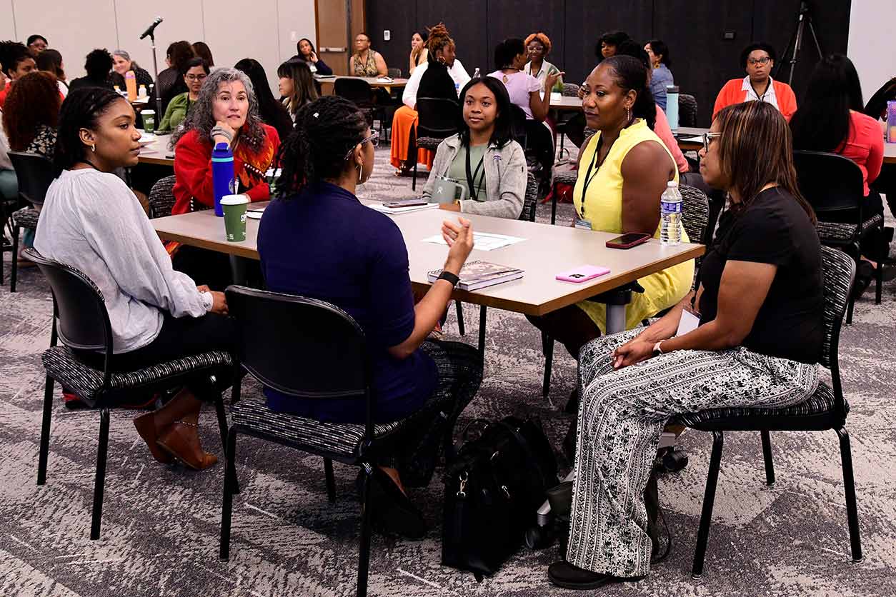 Participants exchanged experiences during the roundtable networking session. (Photo courtesy of Steve McCaw / NIEHS)