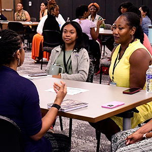 Participants exchanged experiences during the roundtable networking session. (Photo courtesy of Steve McCaw / NIEHS)