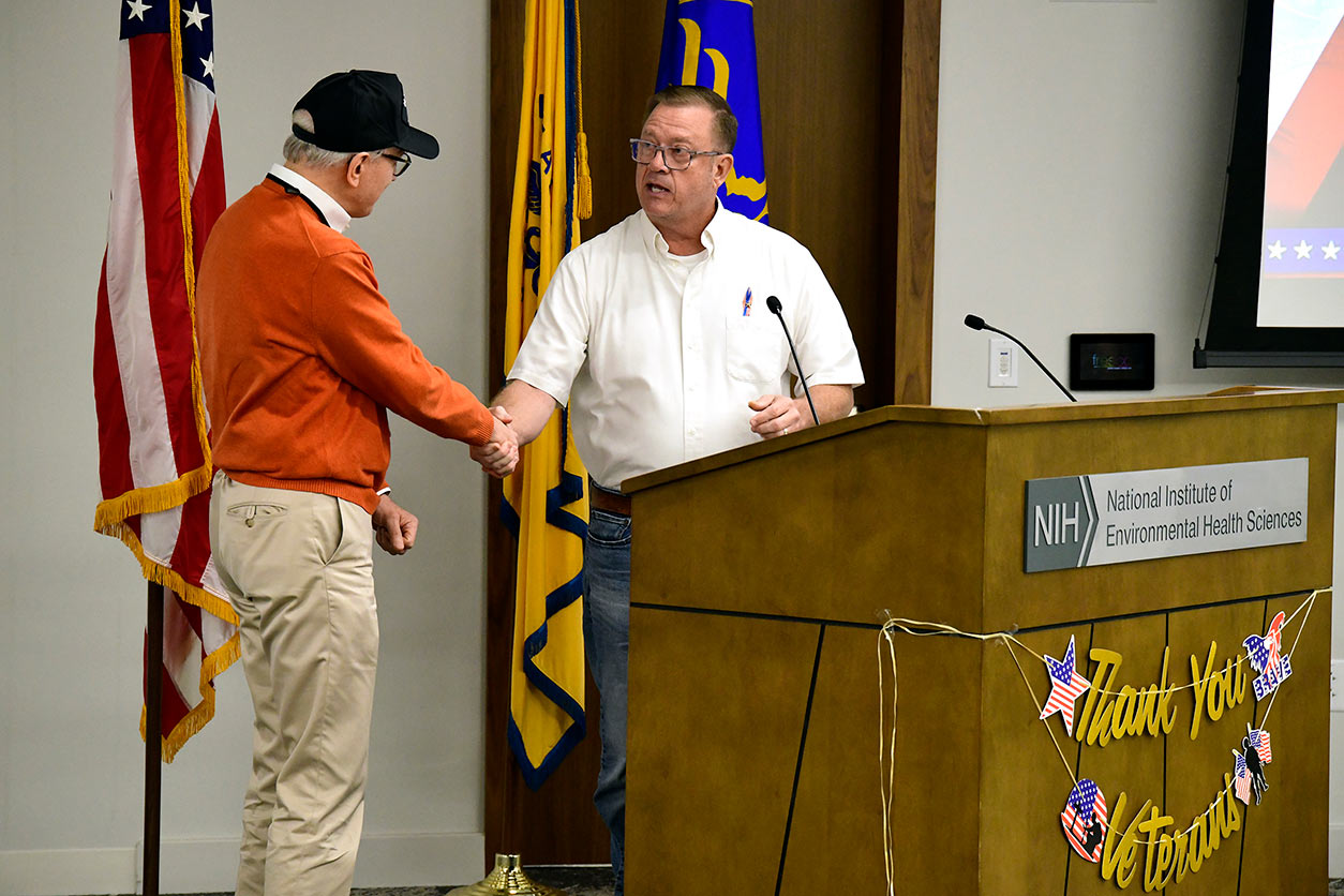 Rick Woychik, Ph.D., left, and Troy Deaton, right