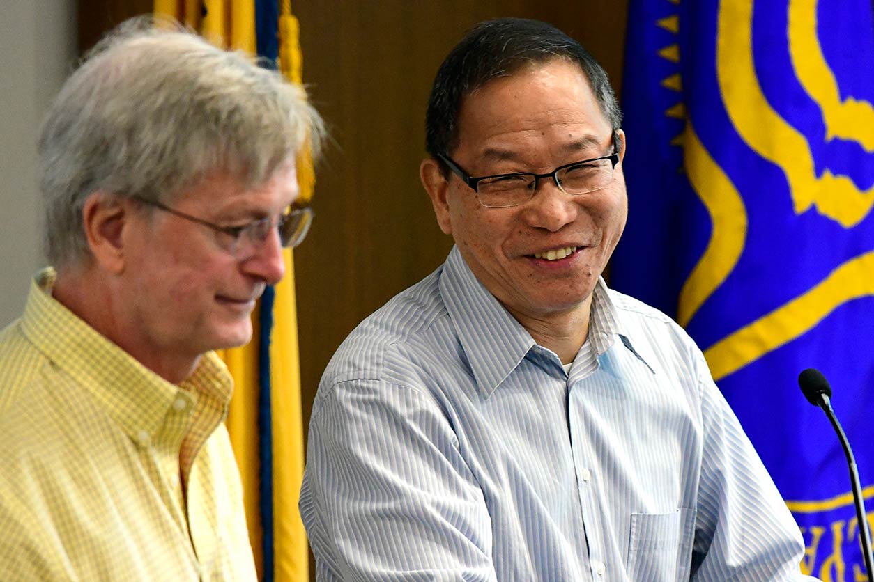 Genomics Day organizer Kevin Gerrish, Ph.D., left, and Jason Li, Ph.D., director of the Integrative Bioinformatics Support Group