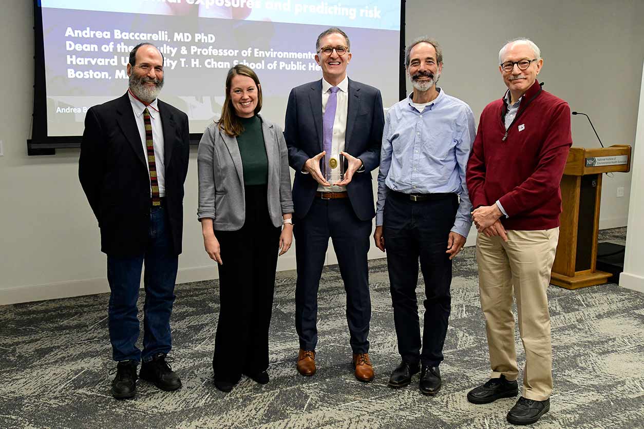 From left to right, Stephen Falk, Alexandra White, Ph.D., Andrea Baccarelli, M.D., Ph.D., Donald Falk, and Rick Woychik, Ph.D. (Photo courtesy of Steve McCaw / NIEHS)