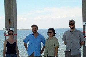 Photo of Sarah Allan and Steven O'Connell, Anderson, and student Kevin Hobbie