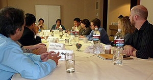 NIEHS delegates sitting at a long table